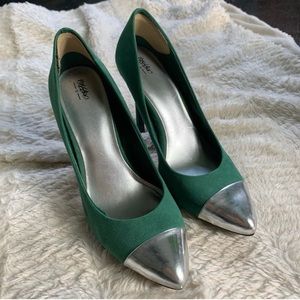 Suede like green heel with a silver pointed toe.